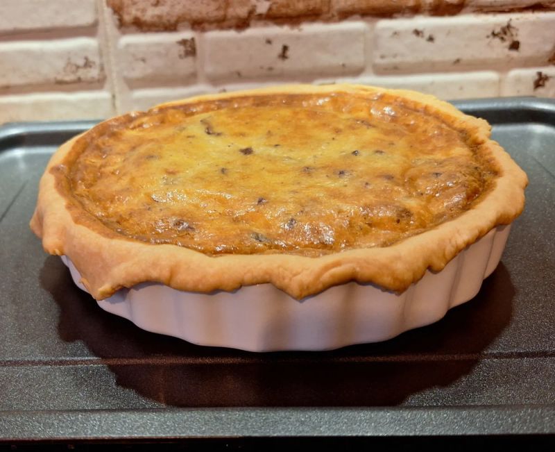Freshly baked Quiche Lorraine in a crisp homemade shortcrust pastry case