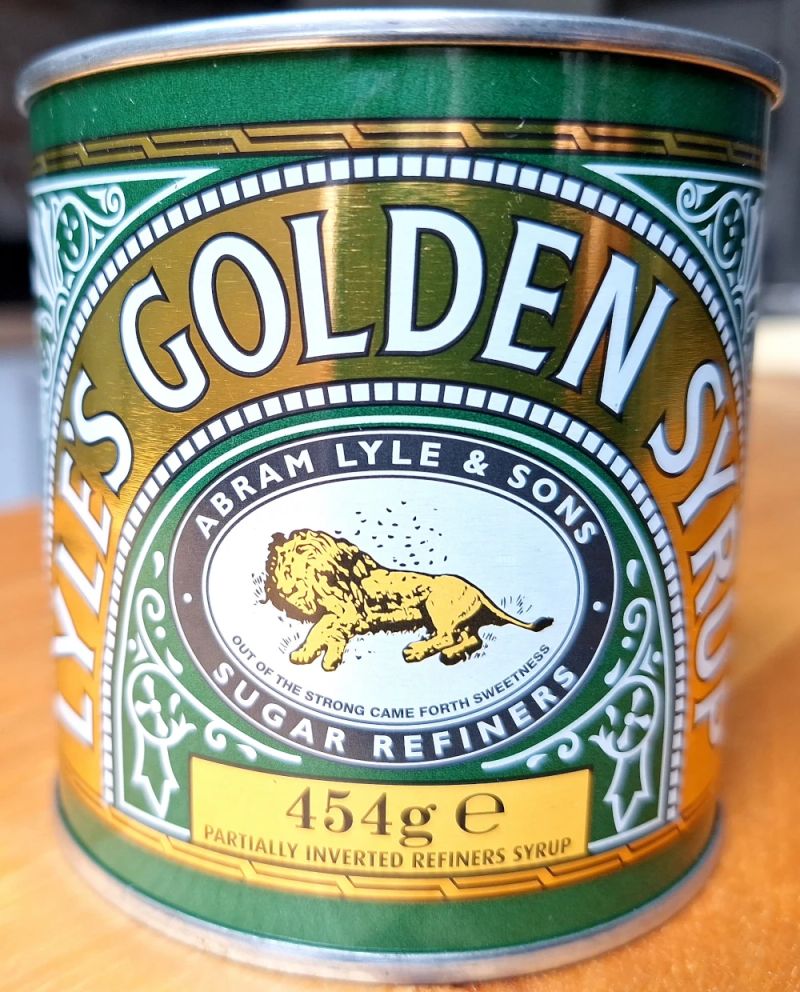 Tin of Lyle's Golden Syrup, a key ingredient used to make homemade ginger nut biscuits.