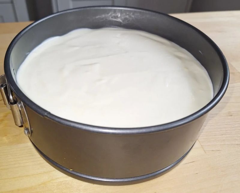 No-bake cheesecake mixture poured into an 18cm spring-form tin