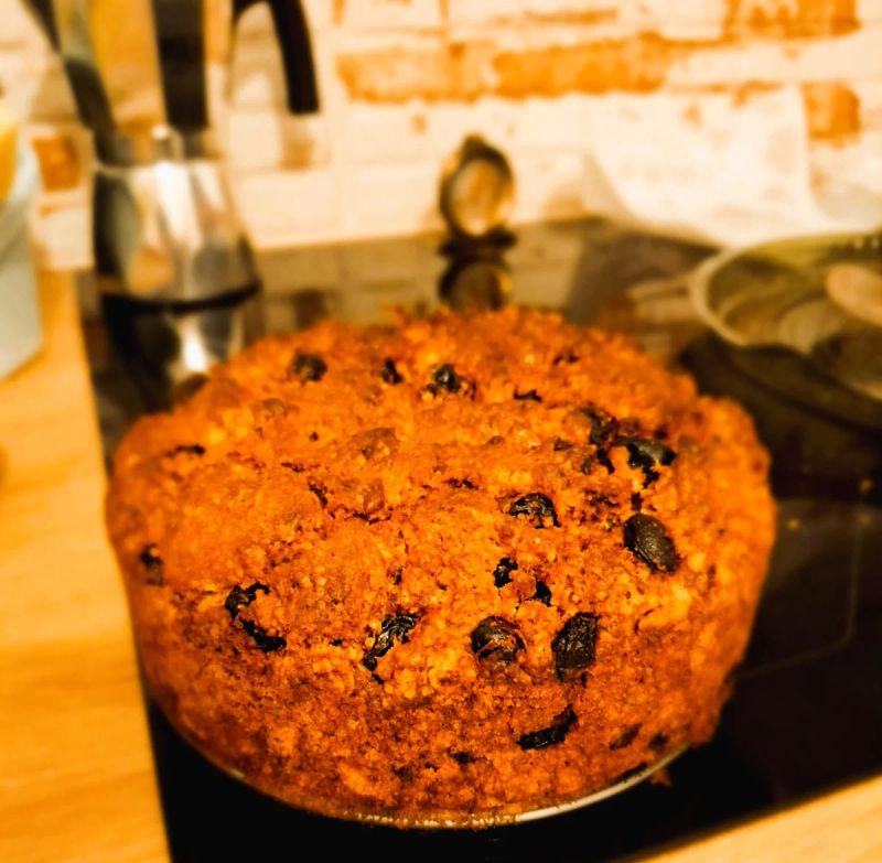 Homemade round whiskey tea cake containing currants and sultanas
