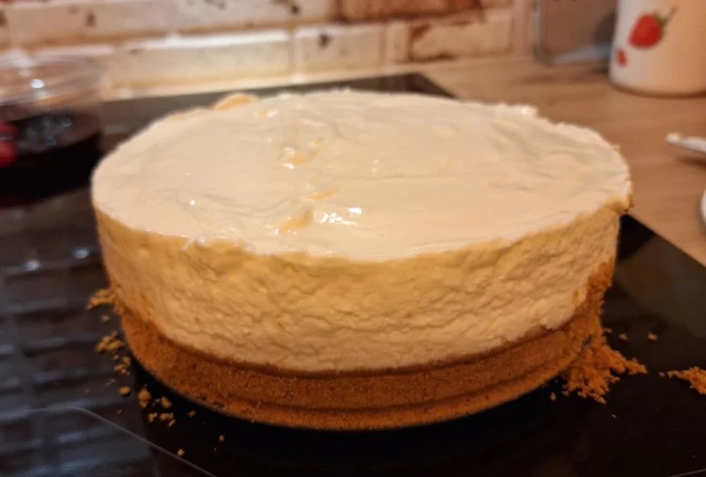 Homemade no-bake cheesecake with a thick creamy filling and biscuit base